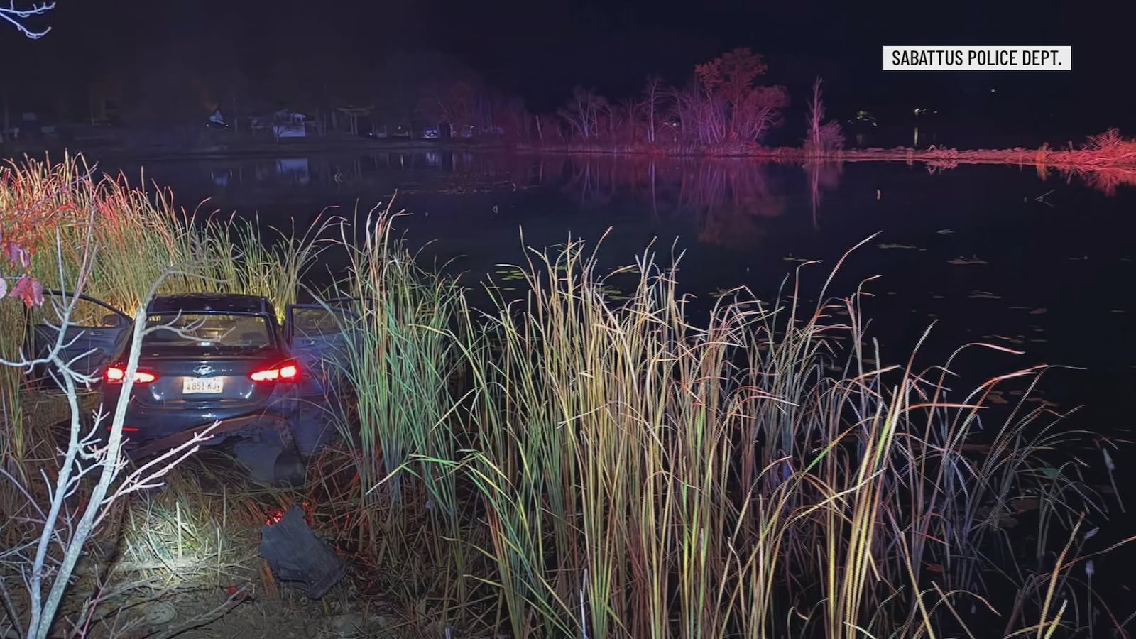 Vehichile Stolen vehicle crashes into pond with 7 juveniles inside, police say