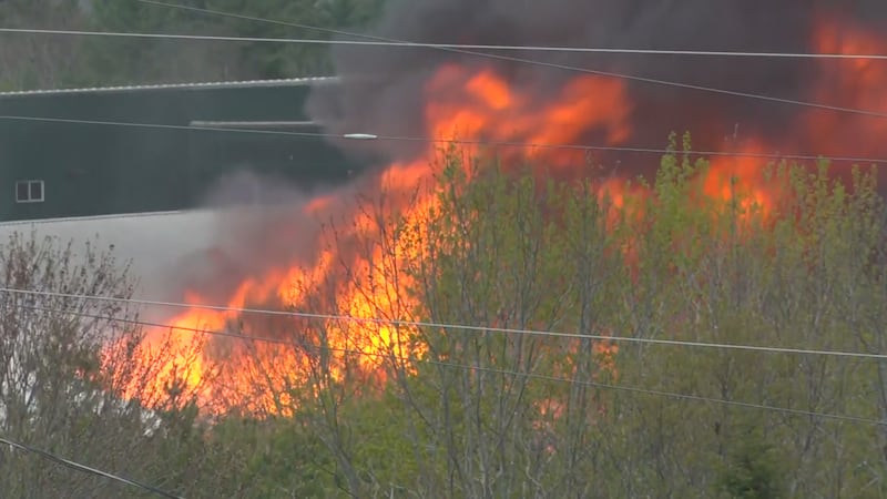 One firefighter is dead and least 10 people have been injured in a fire at Robbins Lumber in...