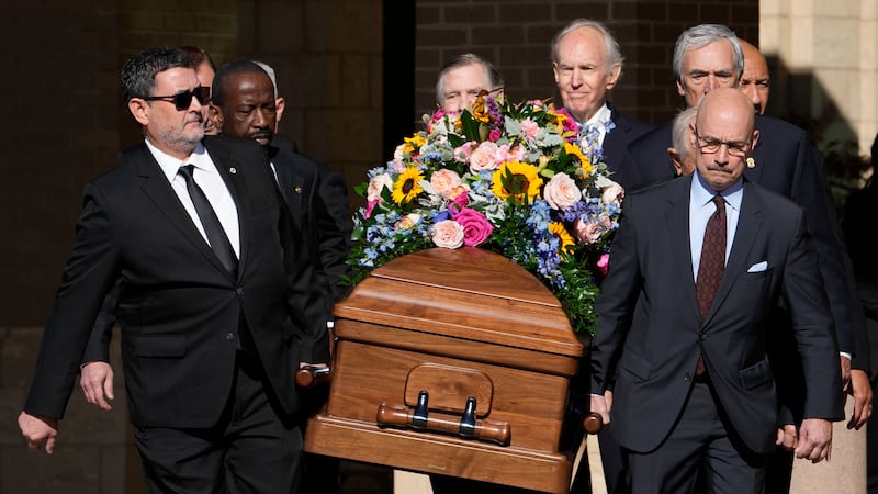 Former and current U.S. Secret Service agents carry casket of former first lady Rosalynn...